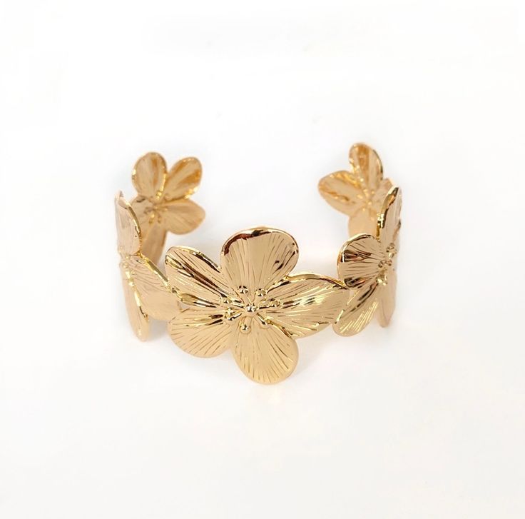 Flower statement bangle - bold, elegant & timeless jewelry for women. Perfect for weddings, parties & gifting. Stylish floral-inspired design.